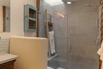 En-suite bathroom with contemporary glass shower